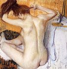 Edgar Degas Canvas Paintings - Woman Combing Her Hair